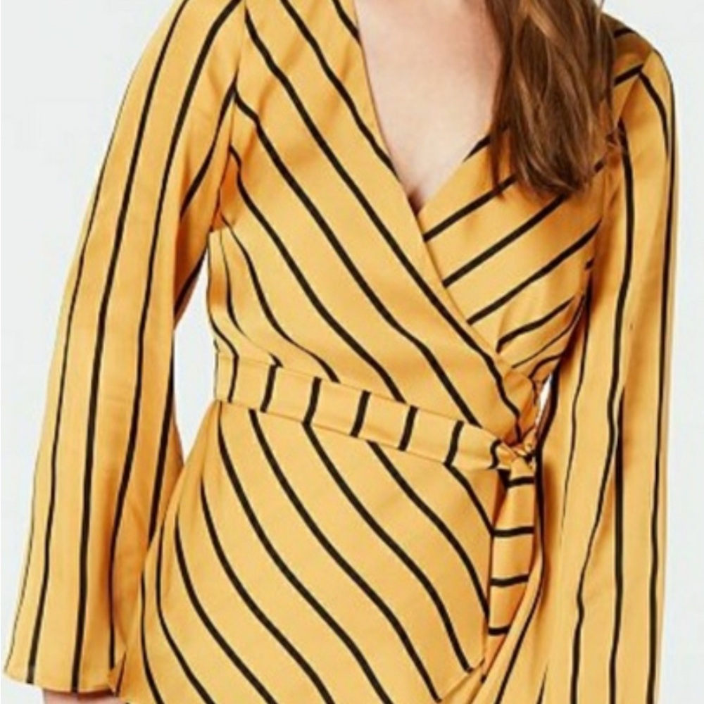 INC INTERNATIONAL CONCEPTS size SMALL yellow wrap blouse with black stripes.
